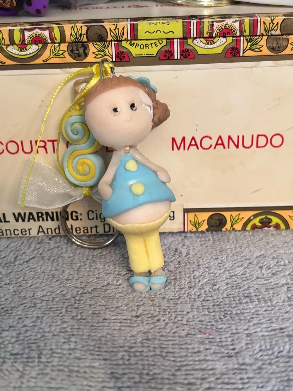 Blue & yellow keychain with a cute figurine and spiral beads #kawaii #cute